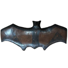 Banco indígena tradicional do povo Mehinaku em madeira escura com detalhes em pintura preta, representando morcego