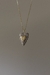 Imagem do Colar Coração Cravejado Latim "O amor vence tudo"