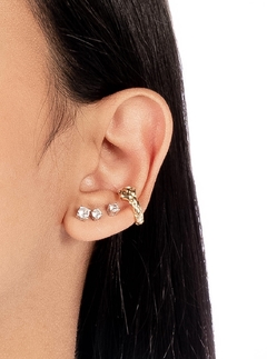 Piercing fake serpente olho esmeralda na internet