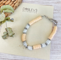 Pulsera fimo y escallas de caracol en internet
