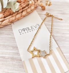 Pulsera de acero dorado estrellas