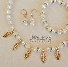 Conjunto de cristales con dijes - Blanco y dorado en internet