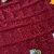 Imagem do Camisa Roma I 23/24 versão jogador vermelha e laranja.