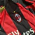 Imagem do RETRO MILAN HOME 2010/11 VERMELHA E PRETA