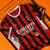 CAMISA PUMA AC MILAN HOME 24-25 VERMELHA E PRETA