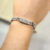 Pulseira Grumet Placa Microcravejada Nano Zirconias Banhadp a Ródio Prata