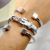 Bracelete Aberto Dadinho em Aço Inox