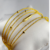Pulseira Corda de Violão com Esferas/Bolinhas Soldadas 07 Voltas no Braço Banho de Ouro 18k