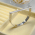 Bracelete Trava Reta Liso em Aço Inox