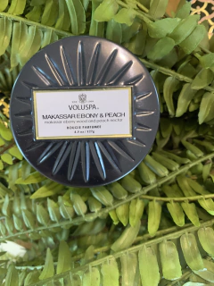 Mini vela lata 25h Makassar Ebony e Peach na internet