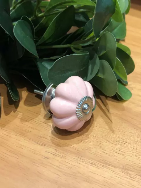 Puxador em florzinha rosa