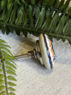 Puxador azulejo com laranja na internet