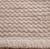 Tapete artesanal Tranças em chenile cru e sisal polar.