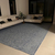Tapete artesanal Tear em chenile azul marinho, algodão cru e sisal natural. - comprar online