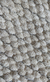 Imagem do Tapete artesanal Tranças em chenile cru e sisal polar.