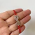 Pulsera infinito en filigrana hilo rojo