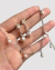 Juego Perla Natural Cadena y Aretes estrella plata ley 950 - comprar online