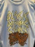Camiseta oficial Black Drawing Chalks (Azul Claro) na internet