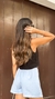 Shorts Saia Angel na cor azul composta por colete na cor preta parte de trás use soffi