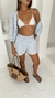 Shorts Firenze na cor azul com litras  com camisa com listras use sôffi 
