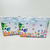 Nécessaire personalizada Jardim Encantado com ilustrações de pássaros e flores coloridas, ideal para festas e casamentos.