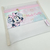 Nécessaire personalizada com estampa da Minnie Mouse segurando donuts.