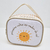 Bolsa personalizada com desenho de sol e a frase "primeira volta ao redor do sol".
