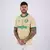Camisa Palmeiras III 24/25 para torcedores, modelo masculino na cor bege, com detalhes em verde.