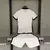 Conjunto de short e camisa infantil do Botafogo com detalhes do design.
