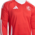 Camisa masculina vermelha da seleção Internacional, modelo 2025/26, com mangas longas e detalhes brancos.