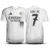 Camisa branca do Real Madrid 2024/25 com o nome Vini Jr. e número 7 nas costas.
