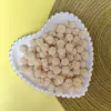 POMPOM DE MALHA TELINHA MARFIM (1,5CM) - 20 UNIDADES