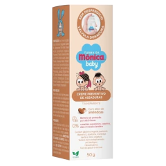 Embalagem do Creme Preventivo de Assadura 50g da Turma da Mônica Baby, destacando ingredientes como óleo de amêndoas e informações sobre proteção contra assaduras.