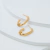 Brinco Dourado Argola Oval com Trança em Aço Inoxidável
