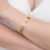 Bracelete Dourado Duplo Multi Circulos em Aço Inoxidável - comprar online