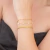 Mix Dourado de Pulseiras Délicat em Aço Inoxidável