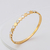 Bracelete Dourado Multi Corações Madrepérola em Aço Inoxidável