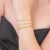 Mix Dourado de Pulseiras Jolie em Aço Inoxidável