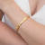Bracelete Dourado Multi Ponto de Luz em Aço Inoxidável - comprar online