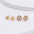 Brinco Dourado Bvlgari Ponto de Luz em Aço Inoxidável