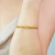 Bracelete Dourado Trançado Minimalista em Aço Inoxidável