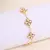 Pulsera Flor 4 Pétalos blanca en internet