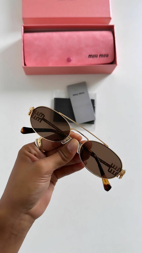 Óculos Miu miu 7a
