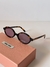 Óculos Miu miu Oval - comprar online