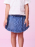 Shorts saia jeans com pregas