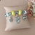 Pulseira berloque - coruja - loja online
