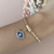Pulseira cordão baiano com olho grego strass na internet
