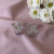 Earhook borboleta na internet