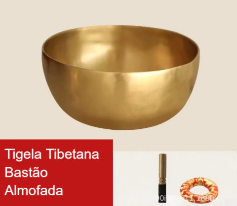 Tigela tibetana de bronze com bastão e almofada, ideal para meditação e relaxamento.