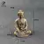 Estátua de cobre do Buda Tathagata meditando, com dimensões de 4,8 cm de altura, 3,4 cm de largura e 2,5 cm de profundidade, pesando 75,8 gramas.